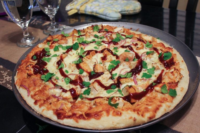 Barbecue chicken pizza with cheese and sauce as an illustrative flatbread topping idea