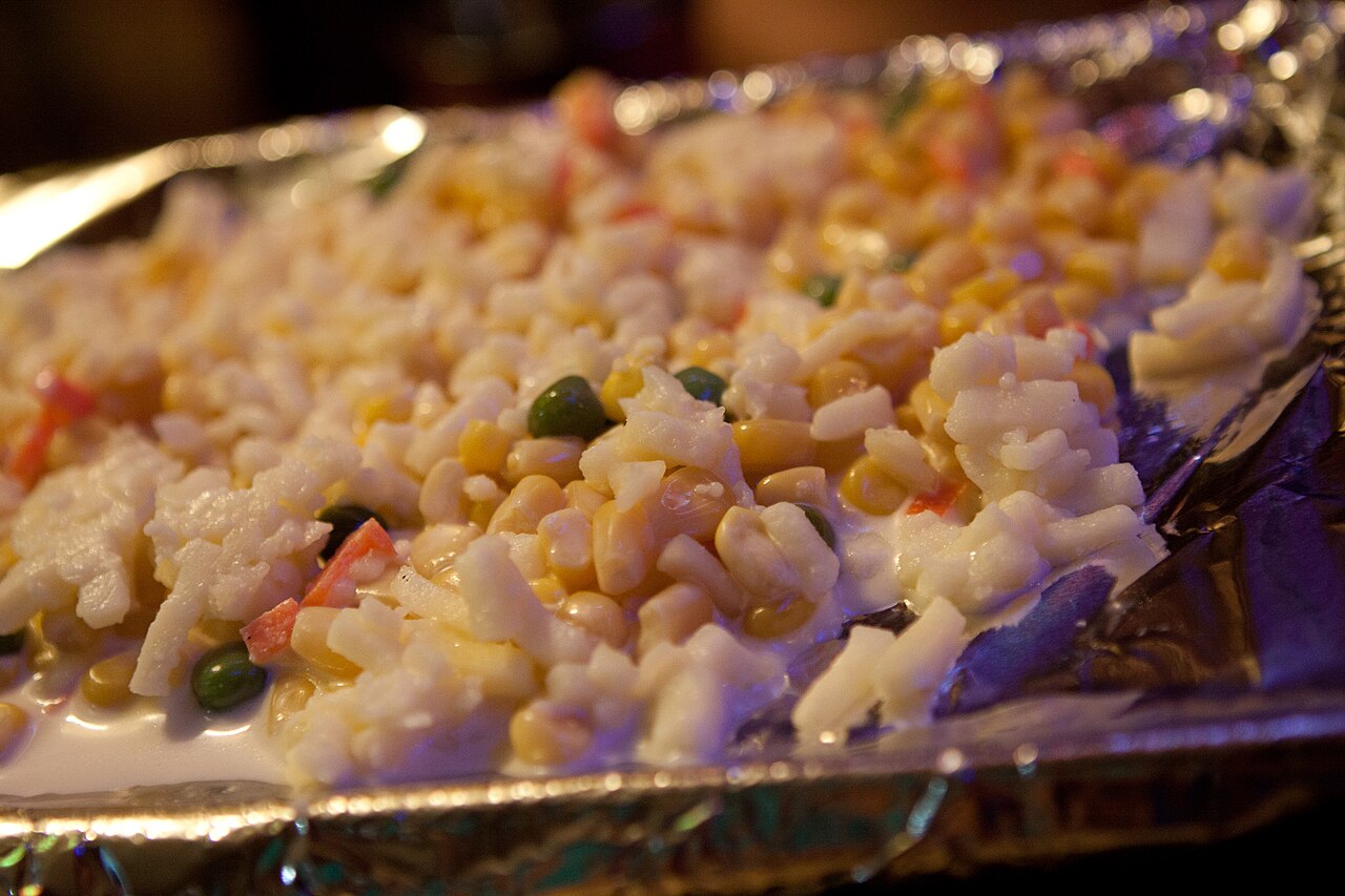 Second view of corn cheese served at a restaurant, illustrating the finished style but not the original home recipe