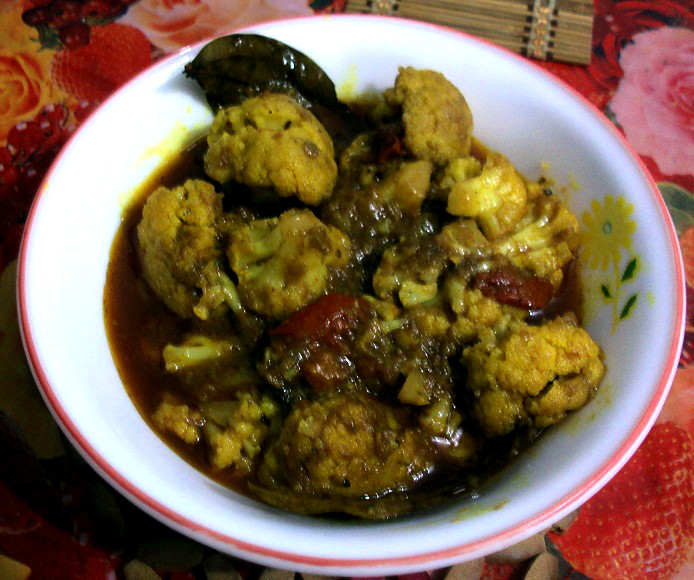 Roasted cauliflower cooked in an Indian-style preparation, not Buffalo sauced cauliflower