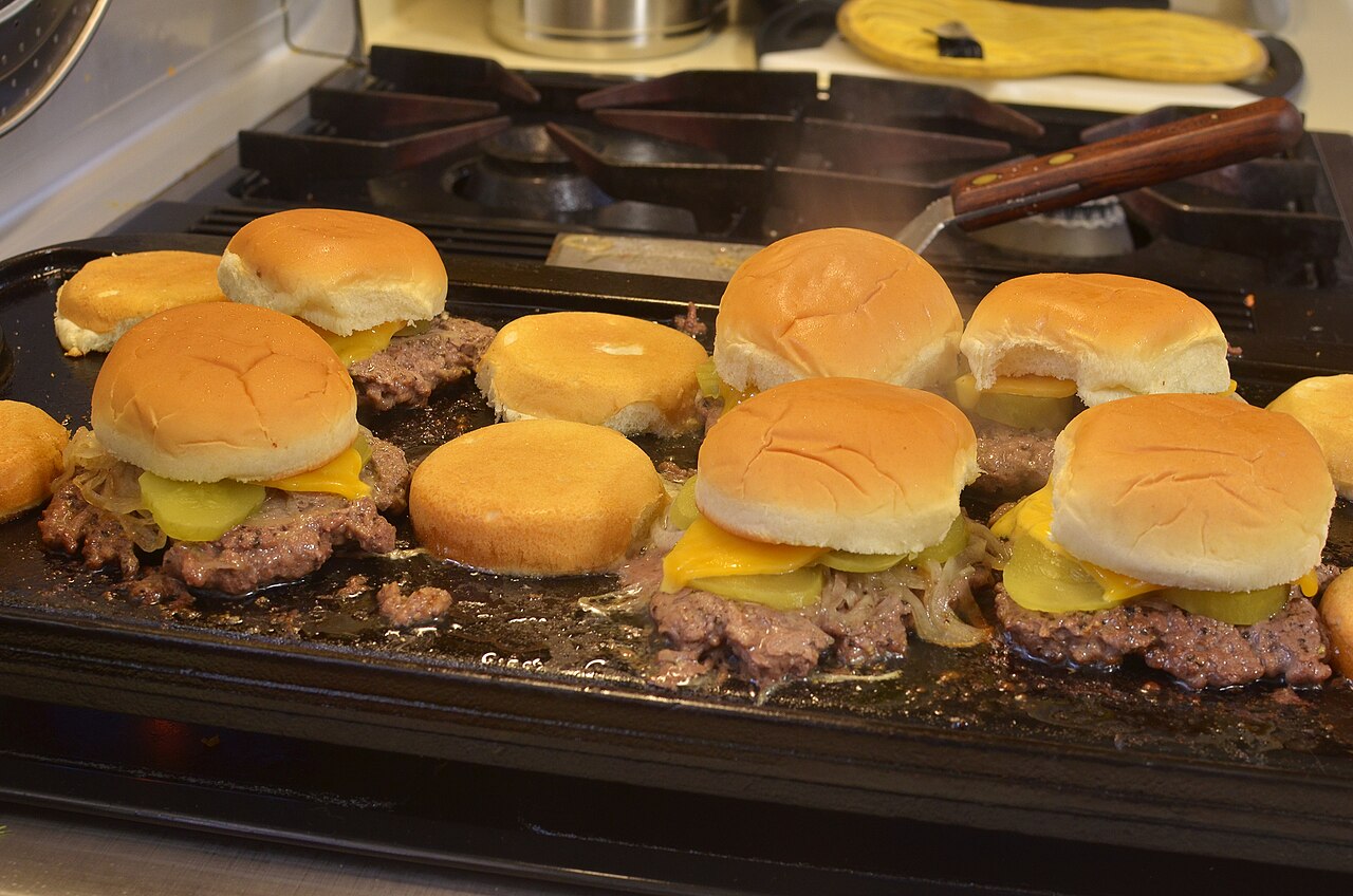Illustrative generic cheeseburger sliders, not Daisy’s actual Hot Honey Slider