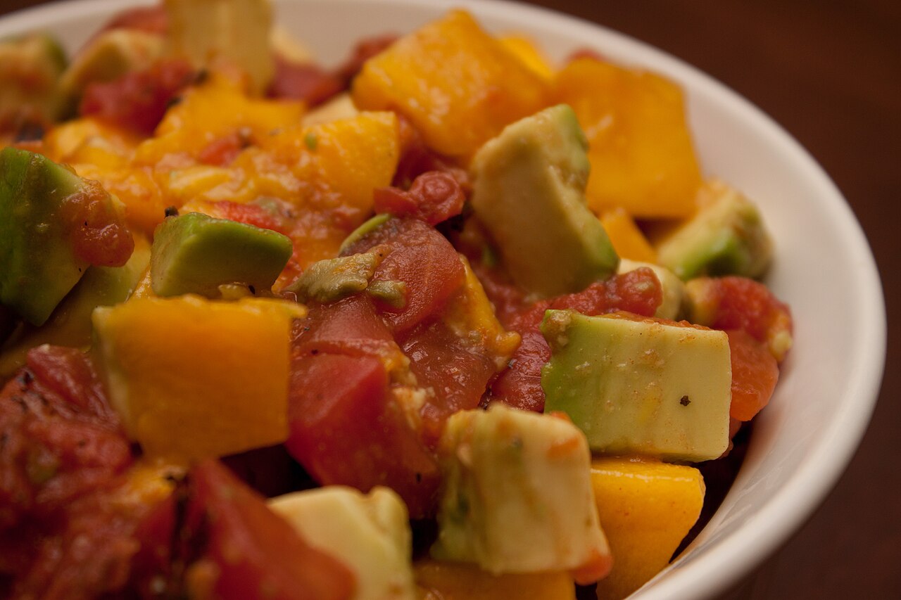 Tropical avocado fruit salsa served in a dish; alternate party salsa illustration